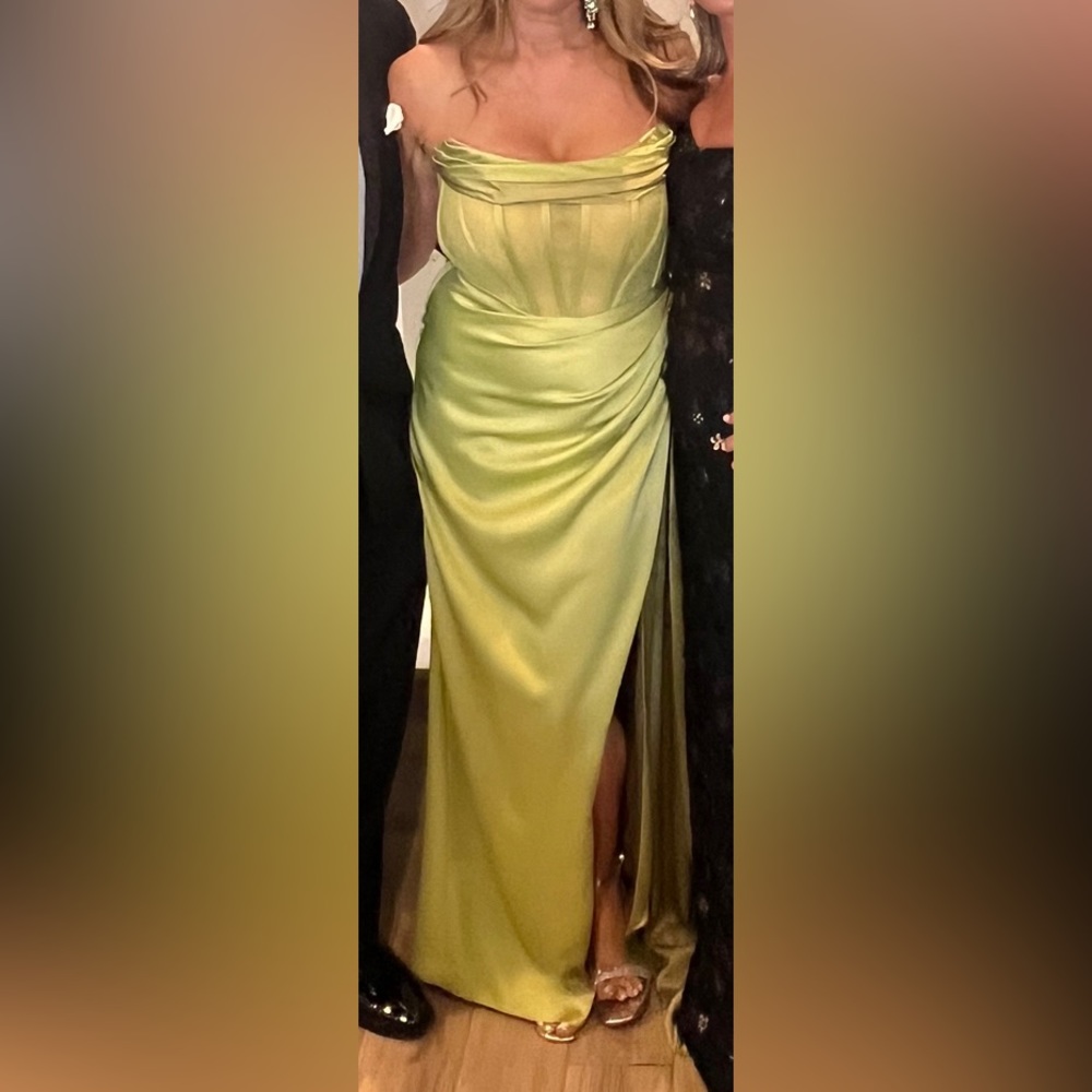 Beautiful peridot green gown with built-in corset, the material is stunning!